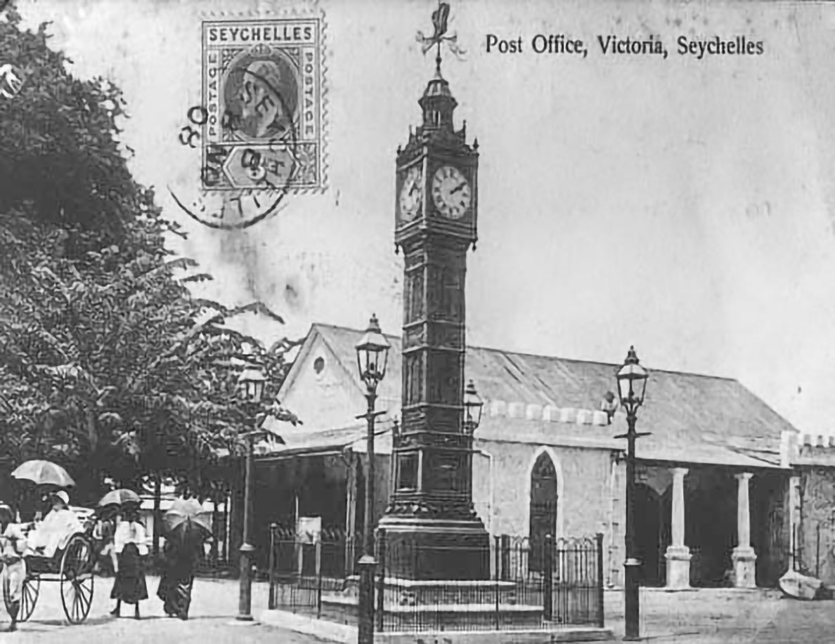 The clock tower in front of the post office, Victoria, Seychelles in the 1900s.