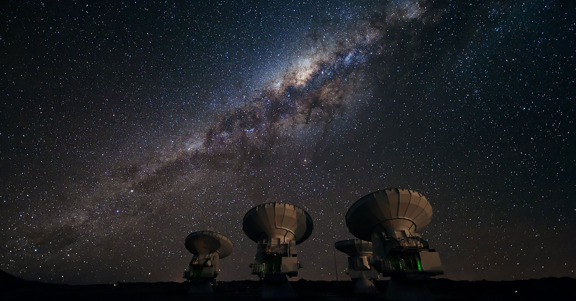 Four antennas of the Atacama Large Millimeter Array (ALMA) on the Chajnantor plain of the Atacama Desert in Chile