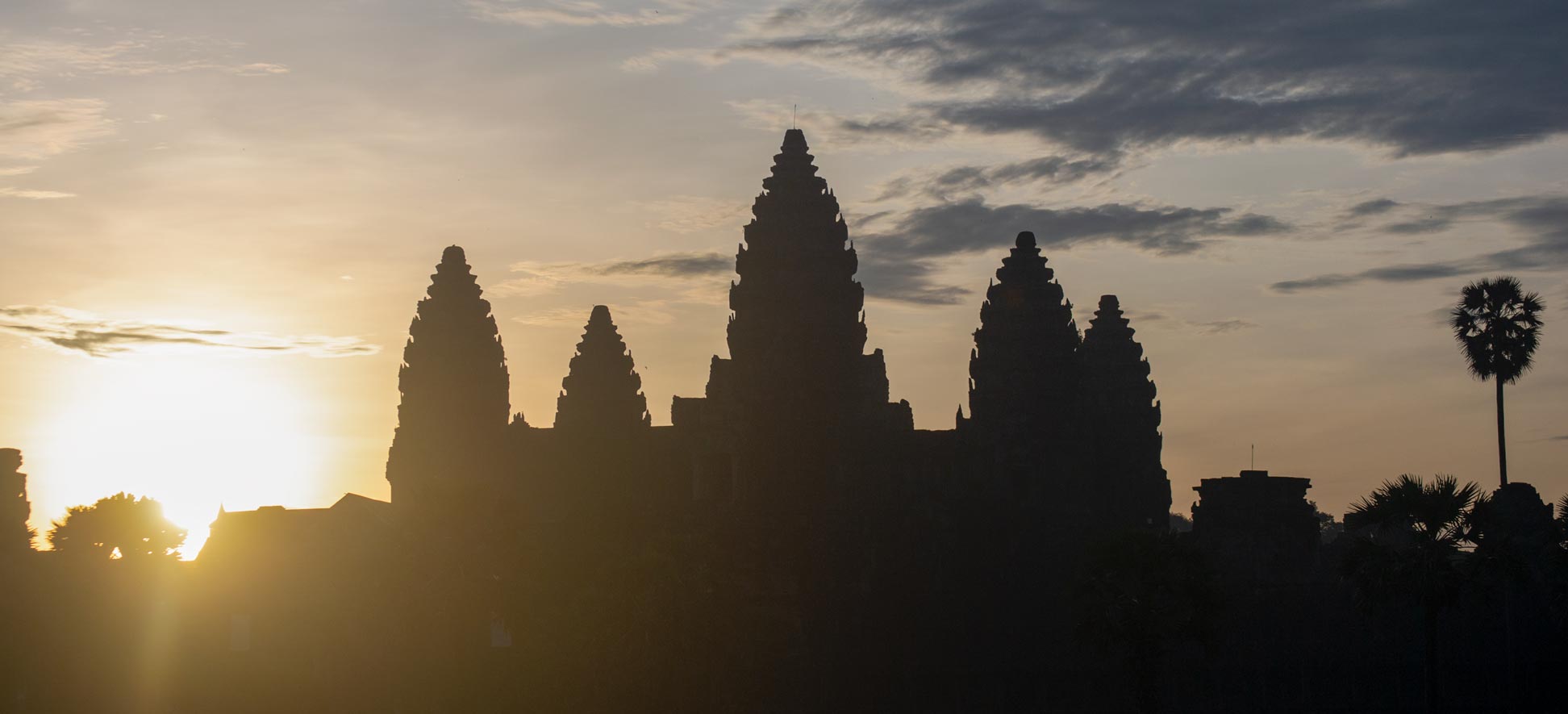 Sunrise at Angkor Wat, main entrance to Angkor Wat, Cambodia.