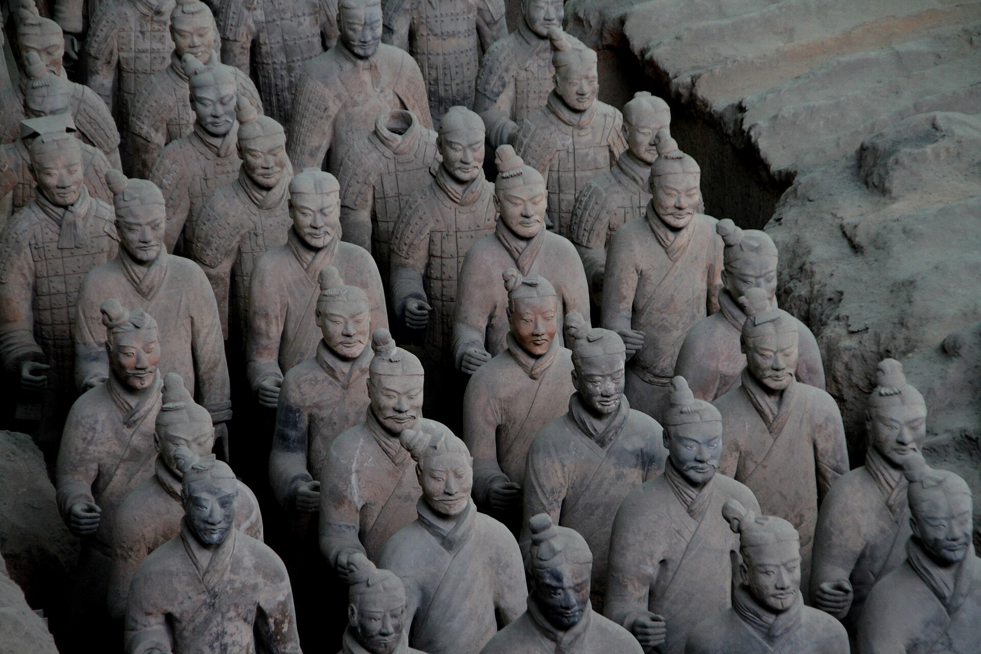Terracotta Soldier figures showing individual faces and armor details.