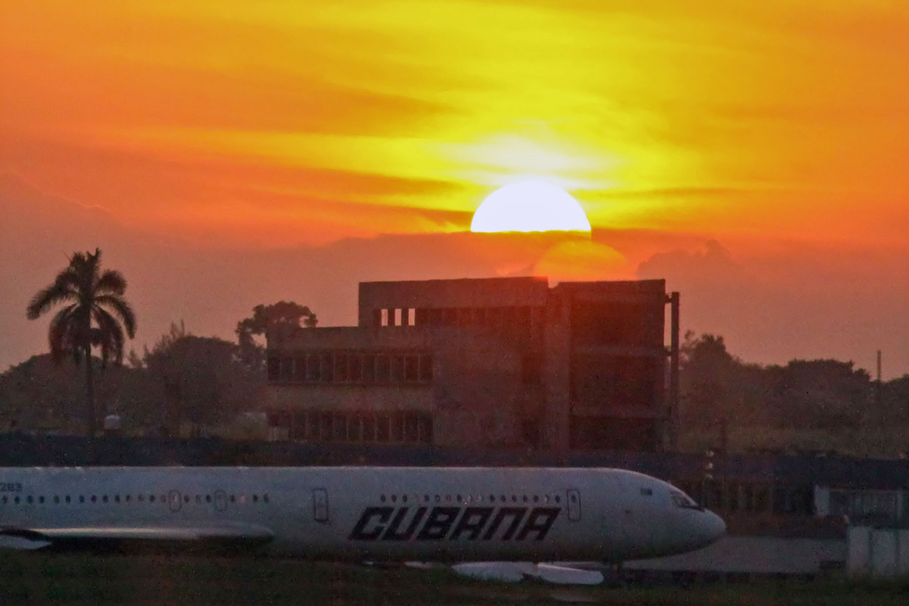Sunset at Havana airport, with Air Cubana plane 
