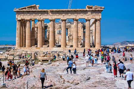 Parthenon, mass tourism at the Acropolis of Athens in Greece.