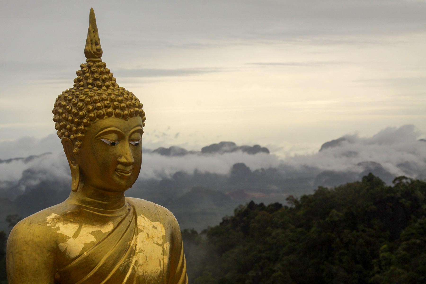 Buddha on top of a mountain in Southern Thailand.