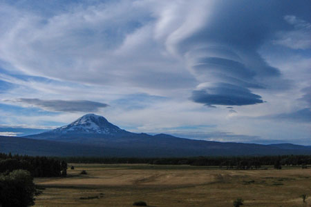 Lenticular clouds forming over Mount Adams